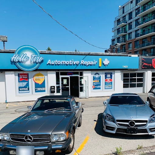 A classic grey Mercedes SL and a silver Mercedes roadster parked in front of Hello Tire